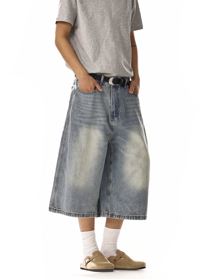 Pantalones de mezclilla casuales de pierna ancha hasta la rodilla 