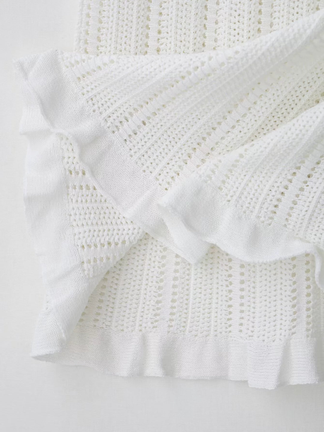 Robe midi sans manches en maille tricotée avec ceinture 