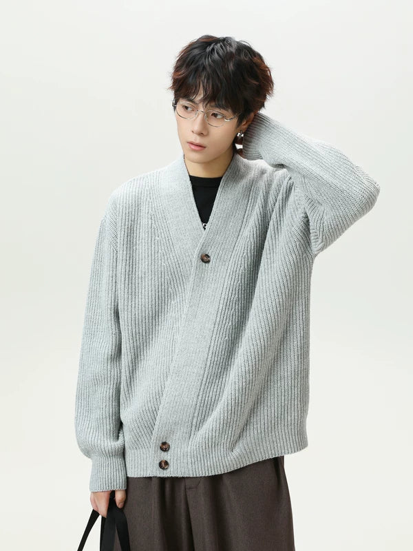 Cardigan en laine à col en V avec bouton diagonal irrégulier 