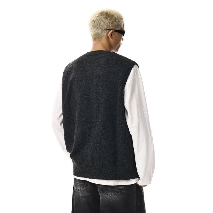 Gilet en tricot à boutons superposés 