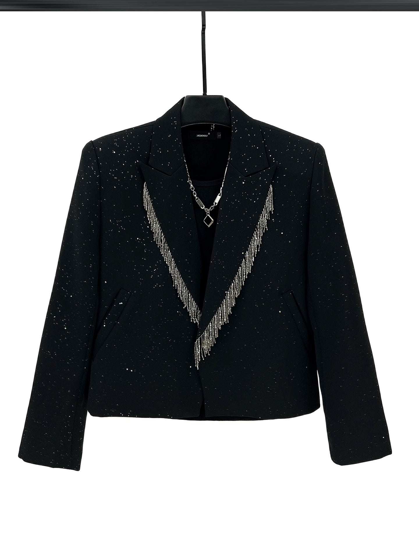 Completo con dettagli in frange e pantaloni a zampa 