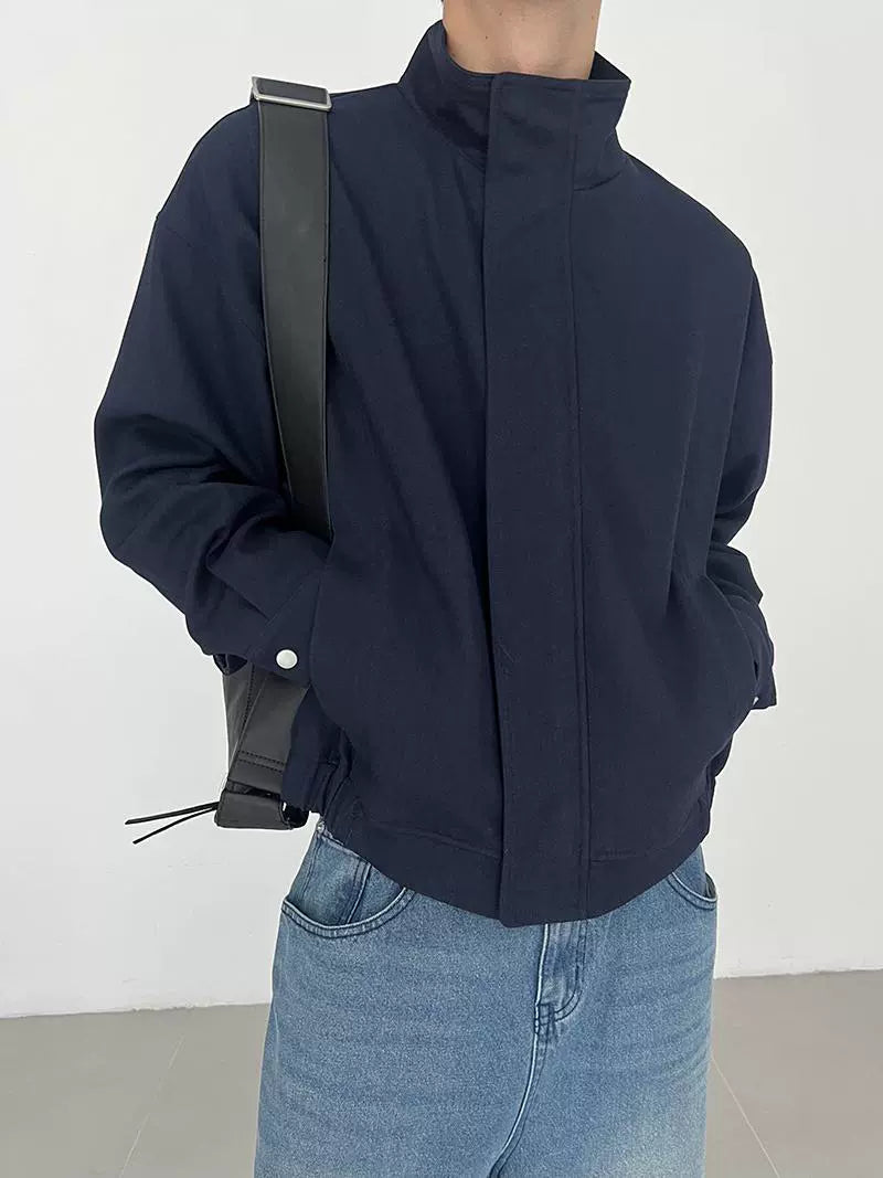 Veste courte minimaliste à col montant 