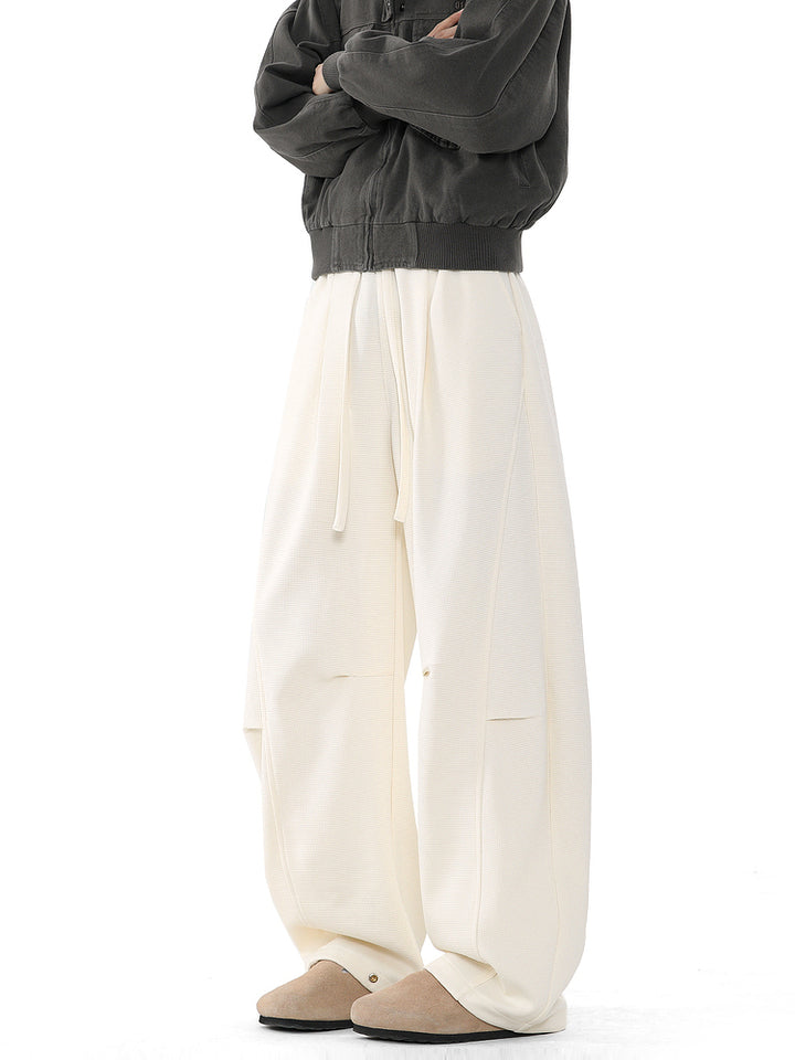 Pantaloni da tuta larghi e svasati retro 