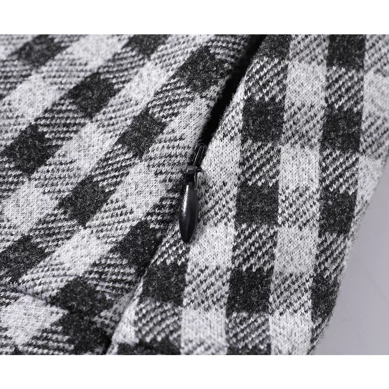 Falda corta de lana con pliegues de cuadros 