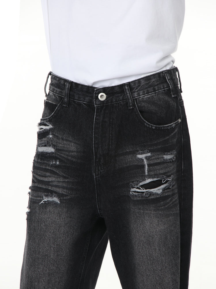 Pantalones de mezclilla anchos desgastados retro 