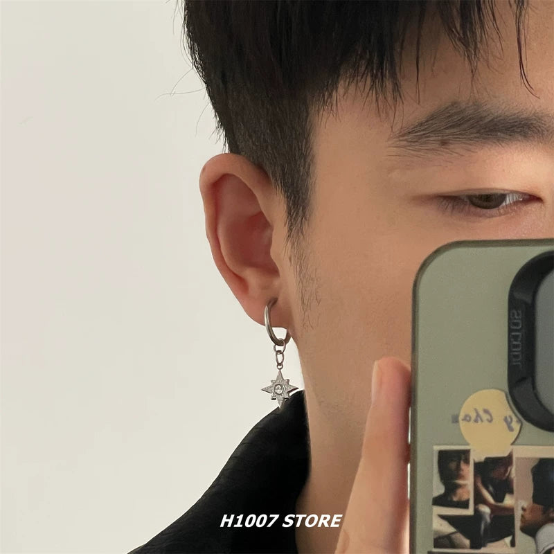 Boucles d'oreilles en acier titane en forme d'étoile 