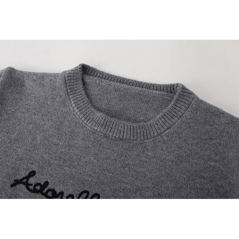 Knitted Sweater and Pleated Skirt
