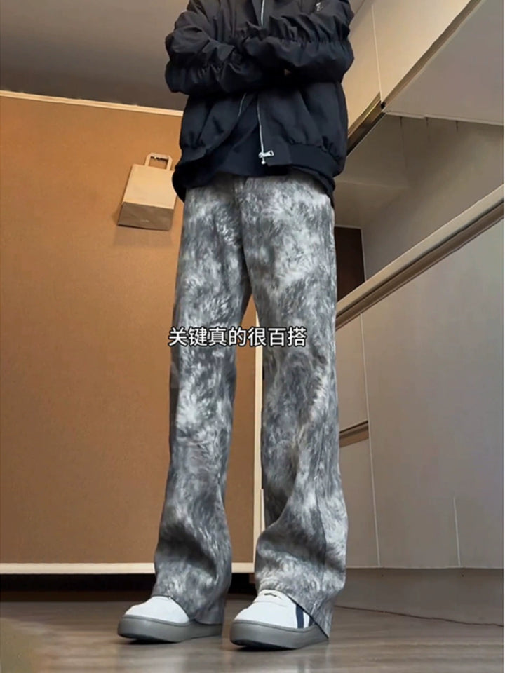 Jeans a gamba dritta svasati in tie-dye 