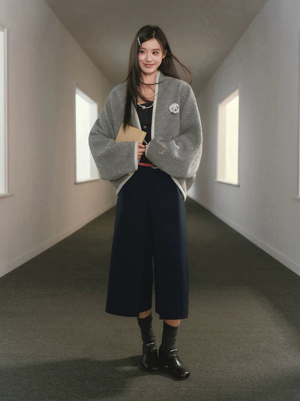 Pantalones de traje midi de pierna ancha con pliegues 