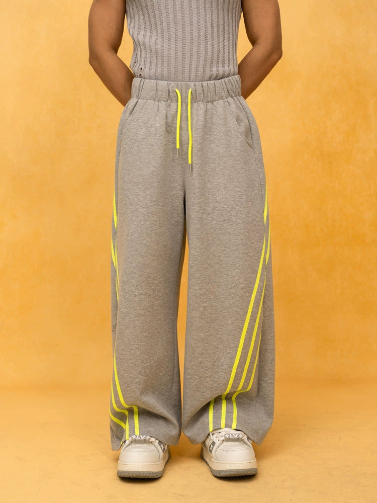 Pantalones deportivos de pierna ancha a rayas con cintura elástica 