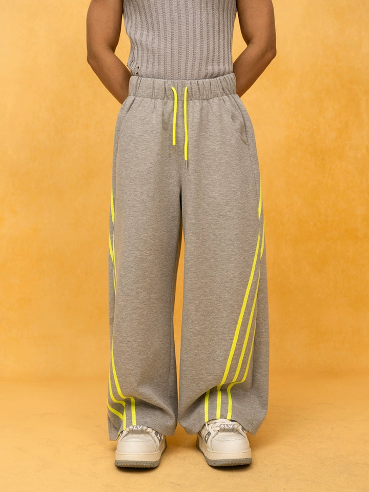 Pantalones deportivos de pierna ancha a rayas con cintura elástica 
