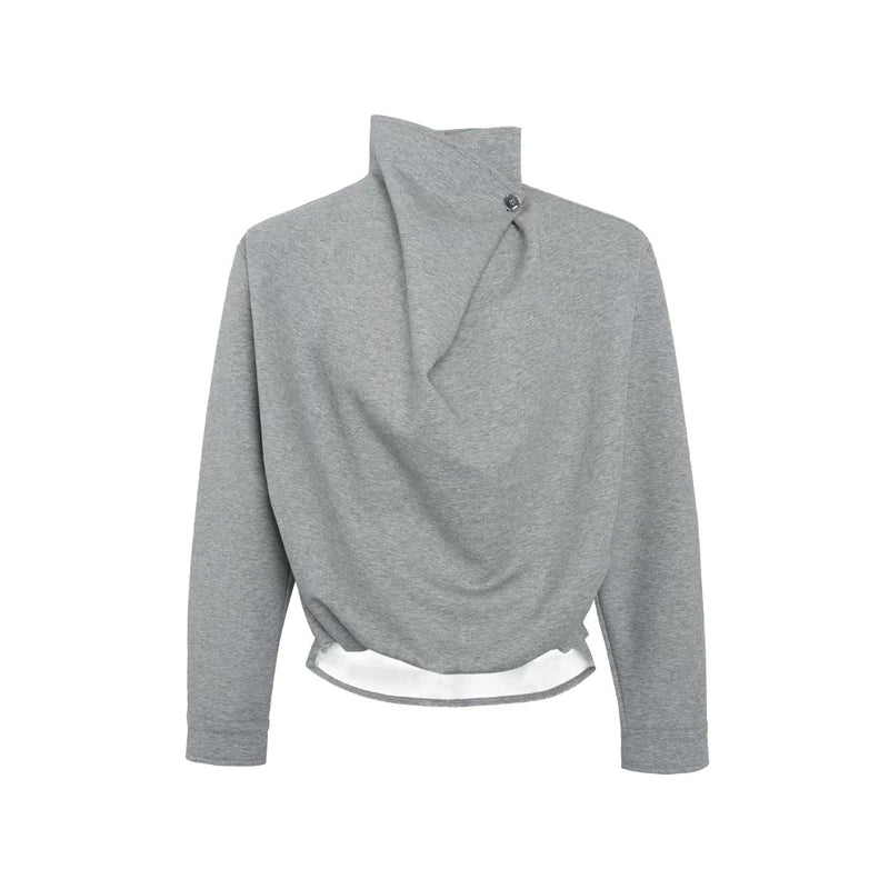 Přesně padnoucí svetr s jedním knoflíkem a stojáčkem 