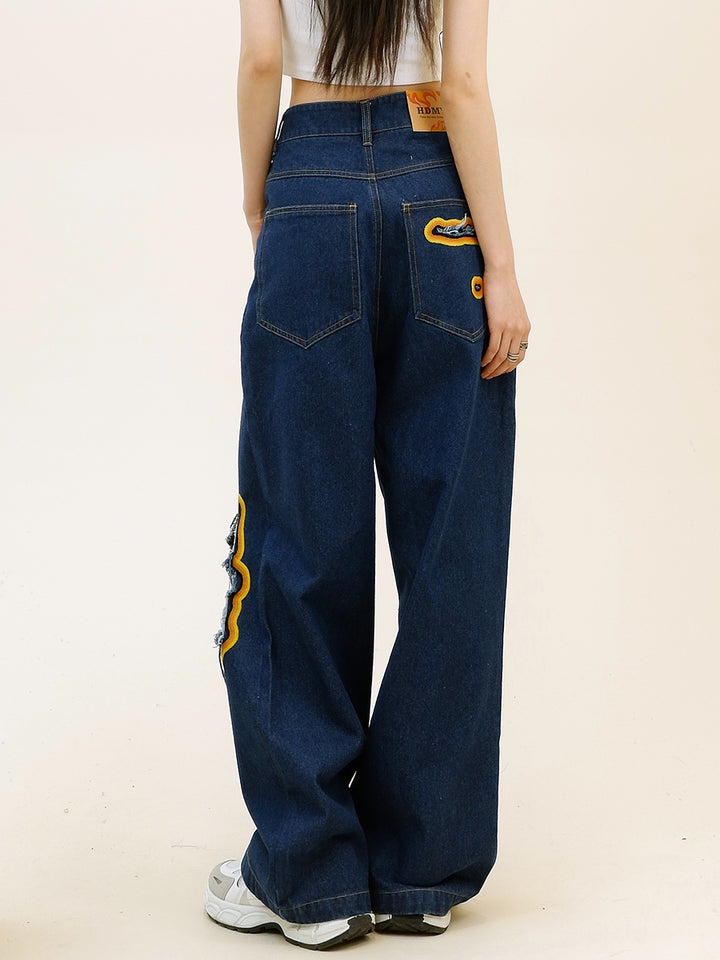 Spodnie uliczne z szerokimi nogawkami w stylu distressed 