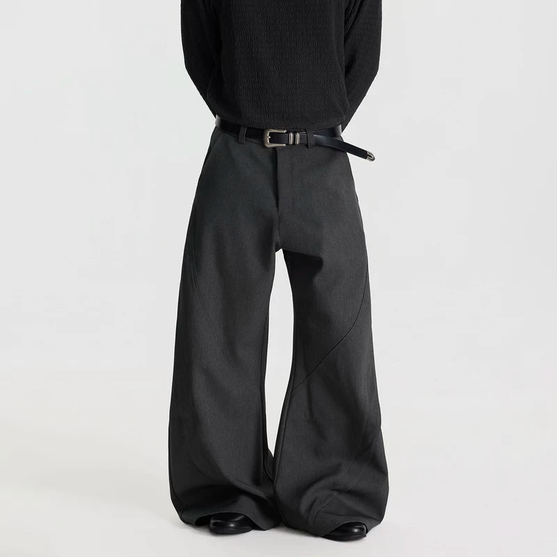 Pantalones plisados de parcheo de pierna ancha deconstruidos 