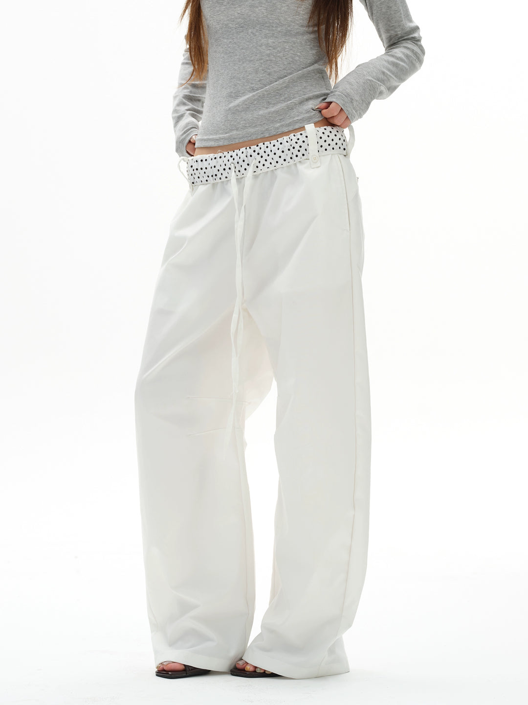 Pantaloni a gamba larga con cintura a pois 