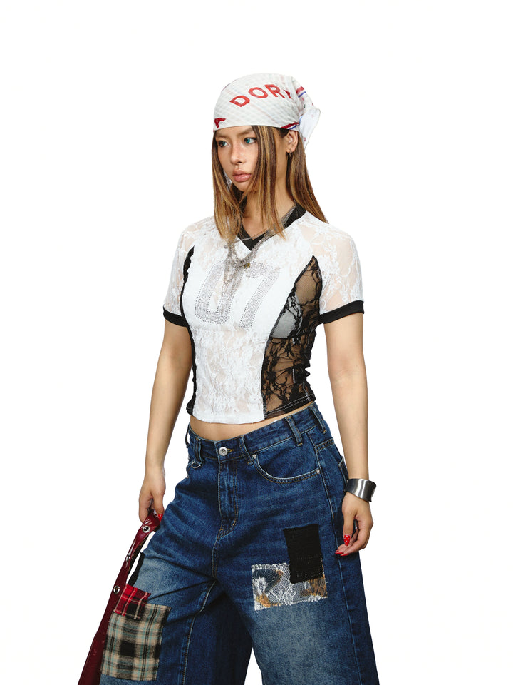Top corto con scollo a V in pizzo trasparente 