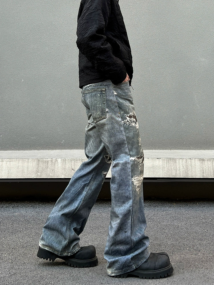Jeans Slim Fit Desfiados com Boca de Sino 