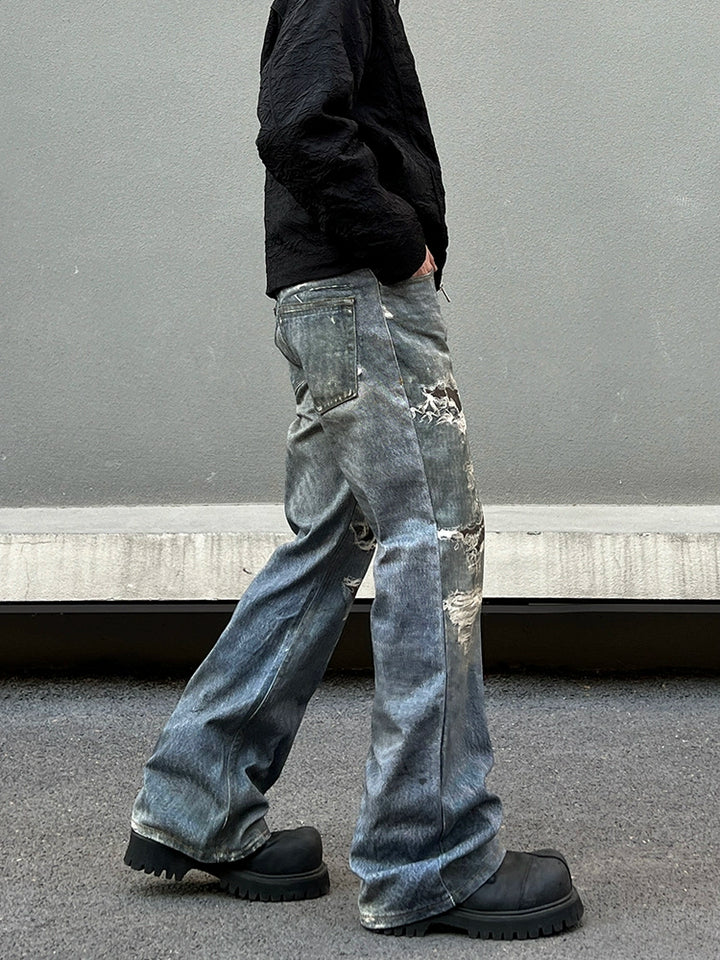 Jeans Slim Fit Desfiados com Boca de Sino 