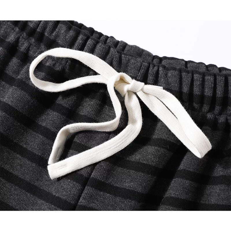 Pantalones de lounge forrados de felpa a rayas 