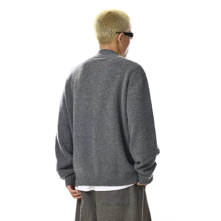 Rundhalslös stickad cardigantröja 