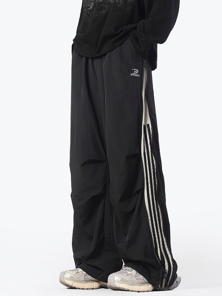 Pantalons décontractés à larges jambes rayés avec zip 