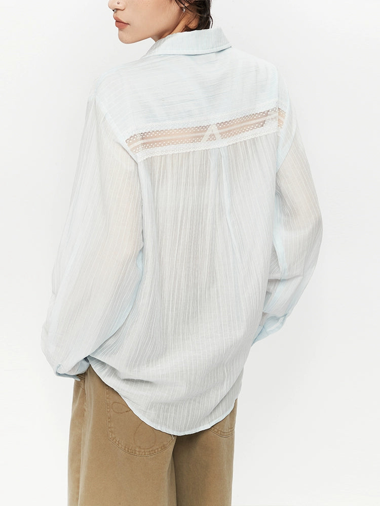 Chemise à boutons à manches longues transparente 