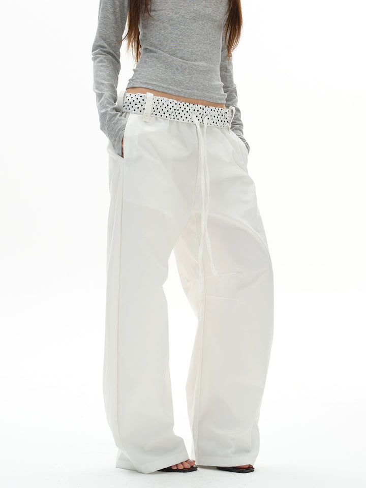Pantaloni a gamba larga con cintura a pois 