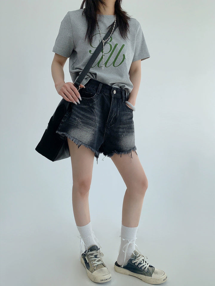 Distressed Denim Shorts with Tassel Hem