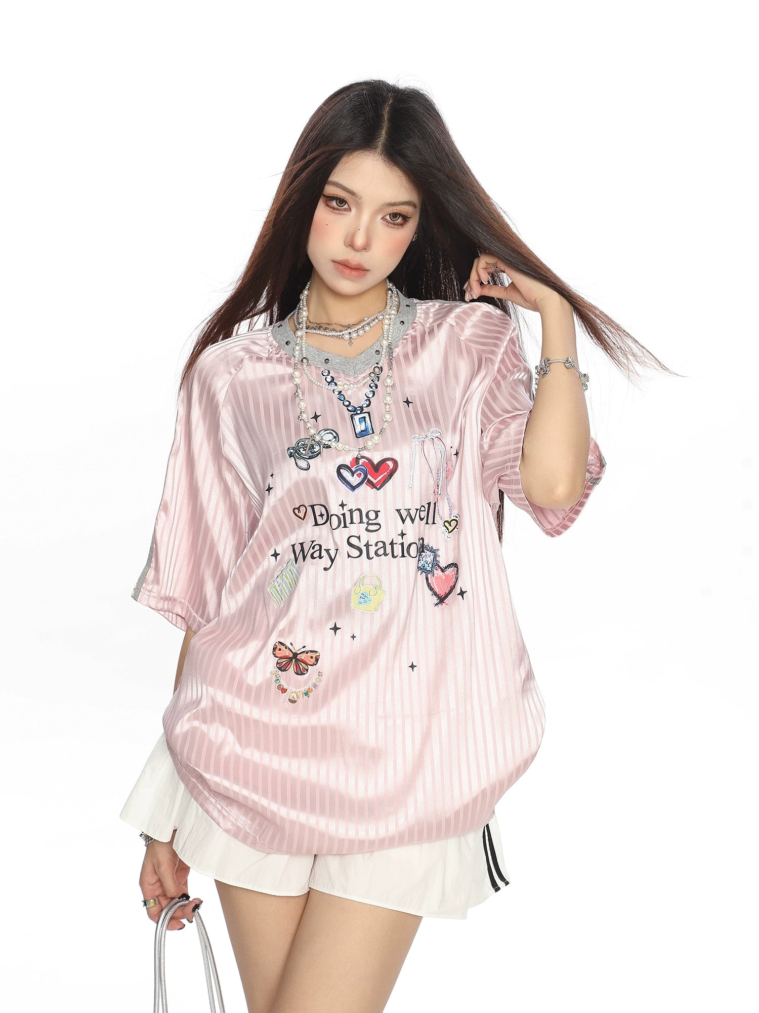 T-shirt larga in stile jersey con graffiti a righe 