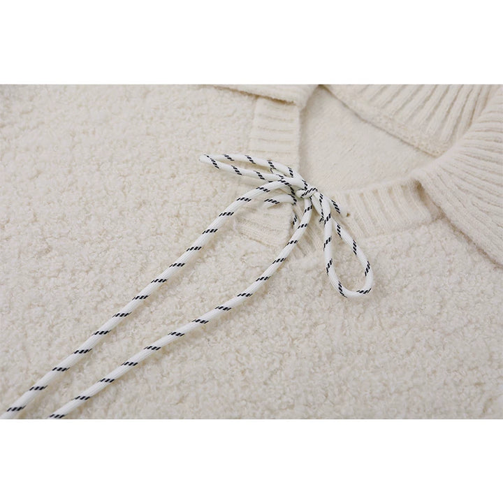 Suéter de punto de cuello en V 