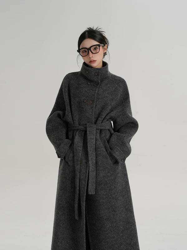 Пальто из шерсти с высоким воротником и двойной застежкой 