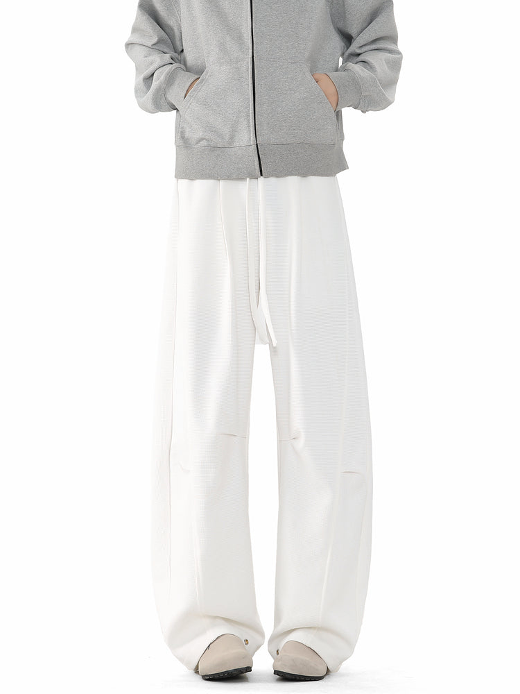 Pantaloni da tuta larghi e svasati retro 