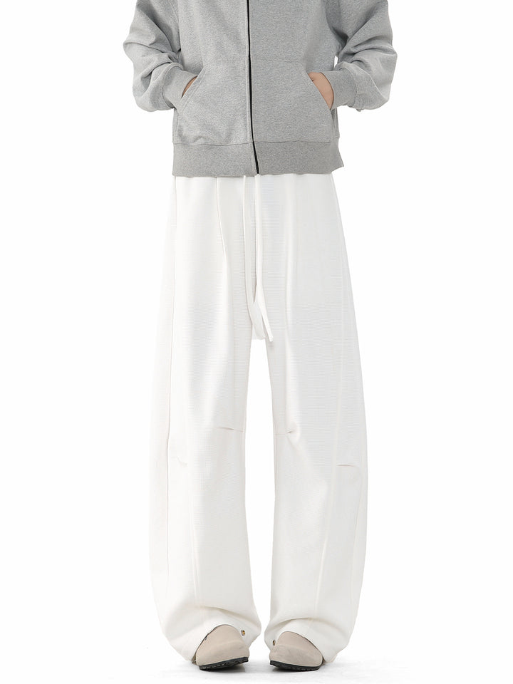 Pantaloni da tuta larghi e svasati retro 
