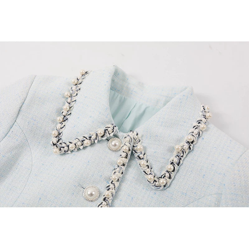 סט של ז'קט קצר מבד טוויד וחצאית 