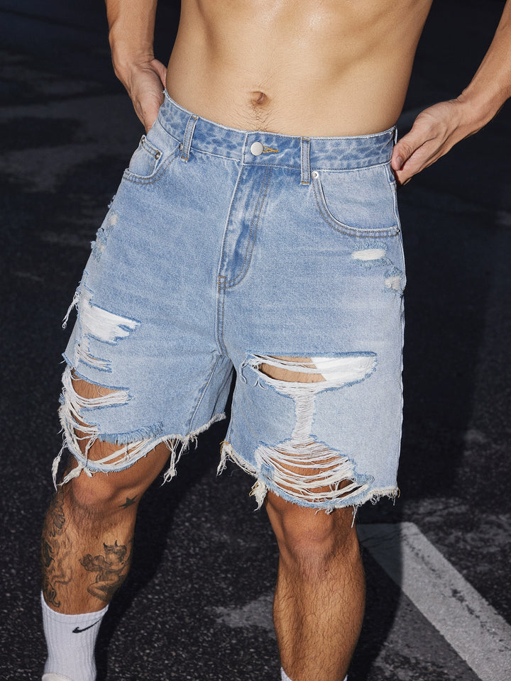 Slidte, revnede, afslappede denimshorts 