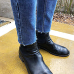 Jean déchiré étiré.