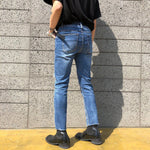 Jean déchiré étiré.