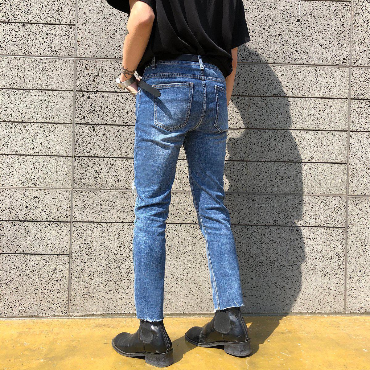 Jean déchiré étiré.