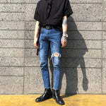 Jean déchiré étiré.