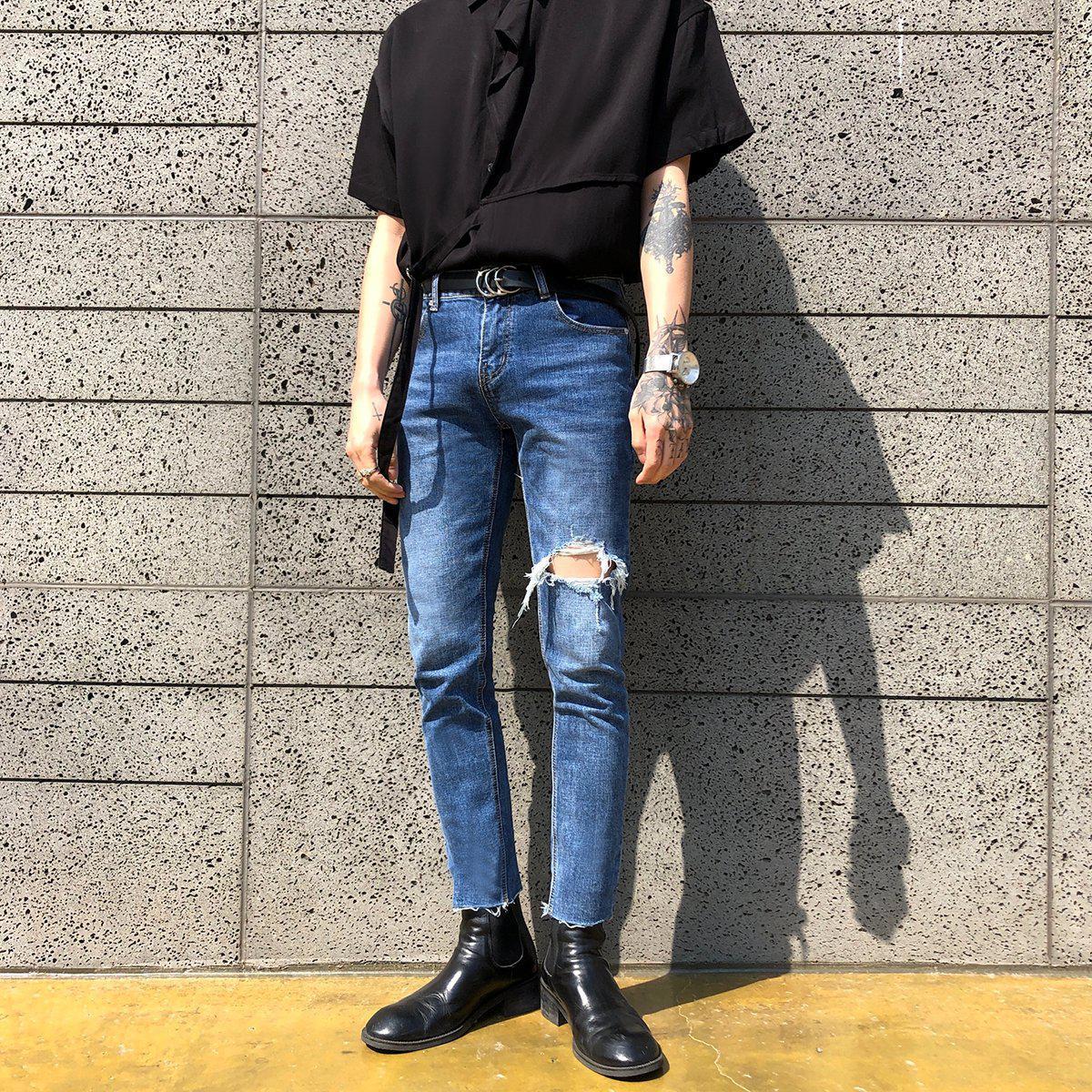 Jean déchiré étiré.