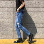 Jean déchiré étiré.