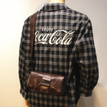 Small Leather Crossbody Barrel Bag